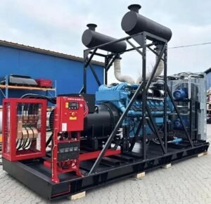 Industrial generator set with blue engine, red control panels and elevated exhaust silencers